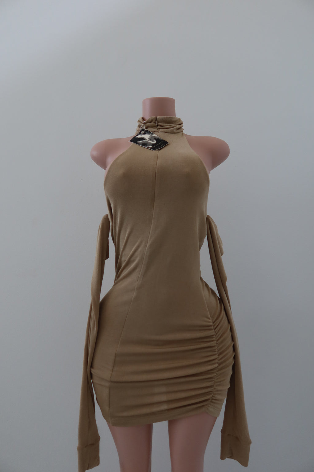 MISBHV beige ‘Metamorphosis 1993’ collection dress