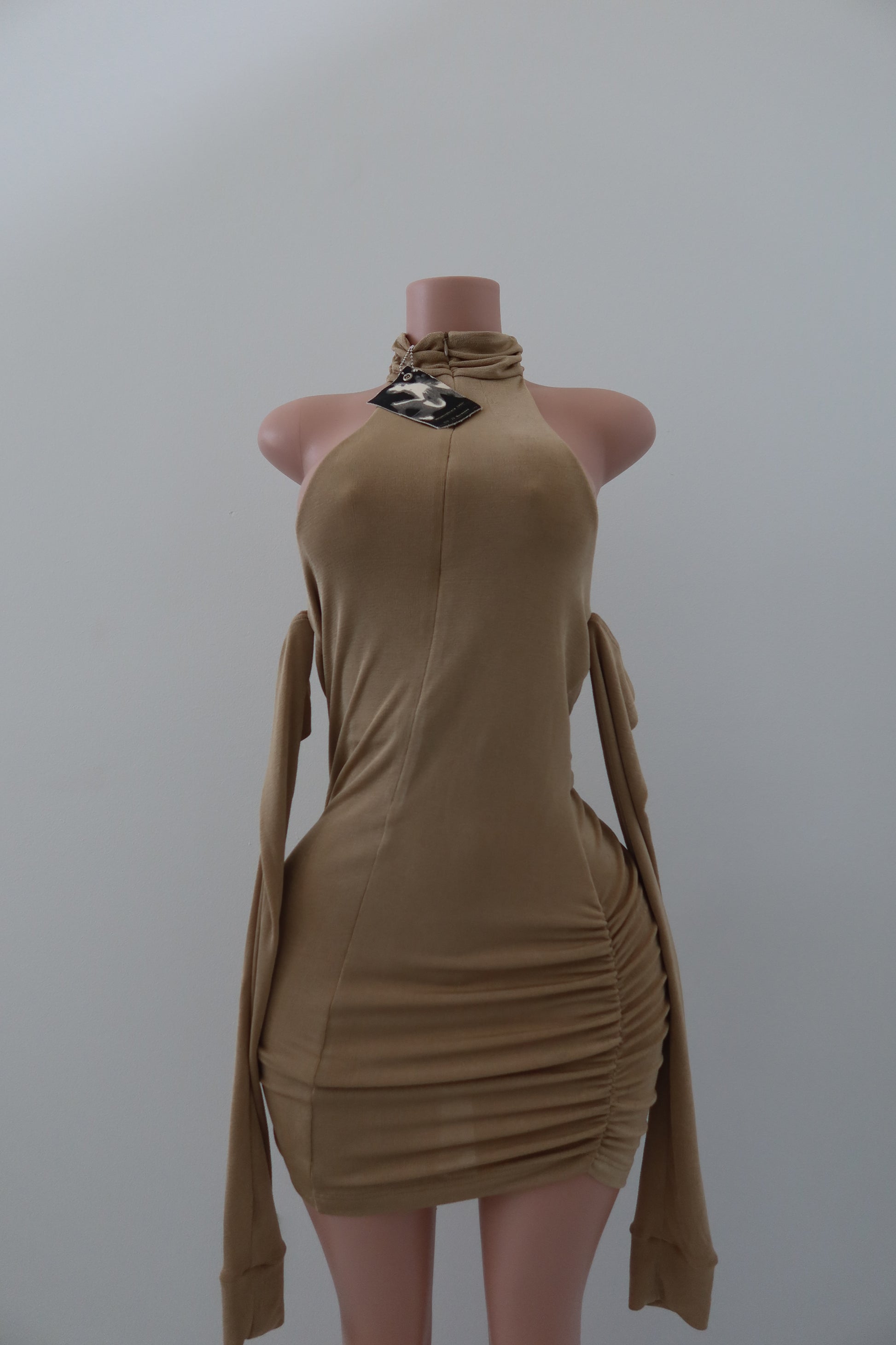 MISBHV beige ‘Metamorphosis 1993’ collection dress